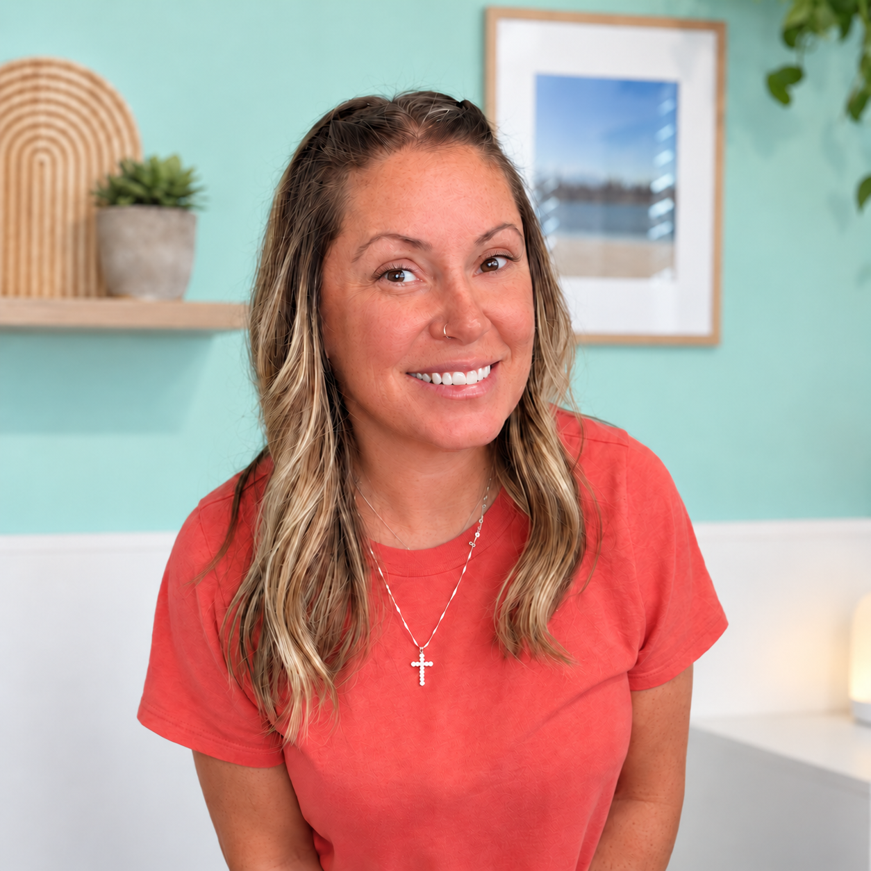 Nicole Dyczewski smiling in her home studio